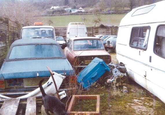 Some of the cars at Doward Farm which planning officials say should be removed.