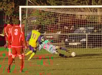 Town win again to extend lead at top
