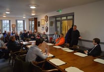 ‘Unacceptable’ plans for new homes traffic discussed at town meeting