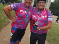 Fundraising pair pedal to the palace for Well Child charity