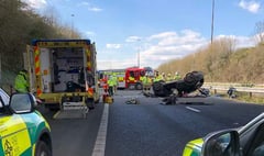Vehicle falls from roundabout onto M48