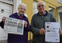Pensioners threatened with court over parking ticket typing error