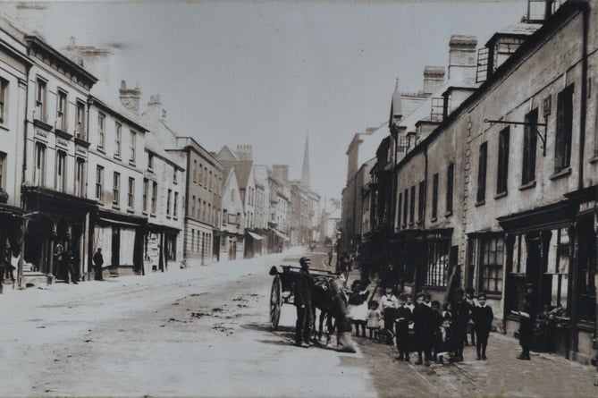 An old black and white photograph of Monnow Street from around 1900.