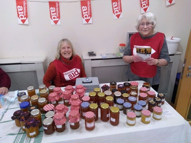Liz Williams and Mary Lewis with some of the jars of homemade marmalade.