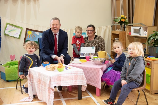 Education minister Jeremy Miles is obviously enjoying his visit to Llandogo Early Years Nurser