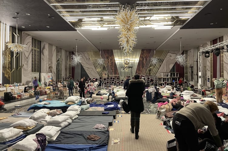 Matei Vaideanu and his party visited this hotel ballroom in Suceava, in north-eastern Romania, that had been transformed into a refugee shelter in just two weeks.