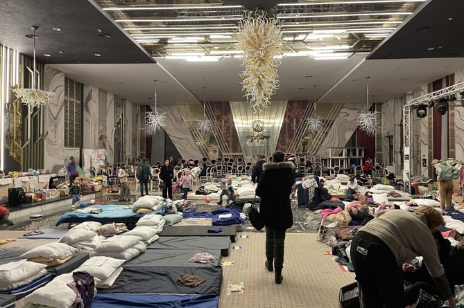 Matei Vaideanu and his party visited this hotel ballroom in Suceava, in north-eastern Romania, that had been transformed into a refugee shelter in just two weeks.