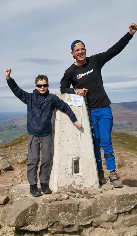 Dante, 10, with TV star Ed on top of the Sugarloaf during his mammoth challenge