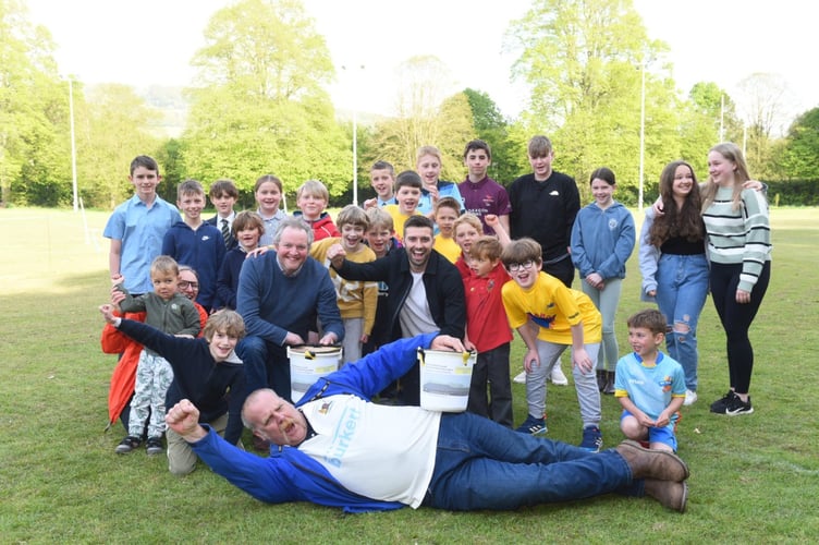 Mark wood ,cricketer and  some of his fans 