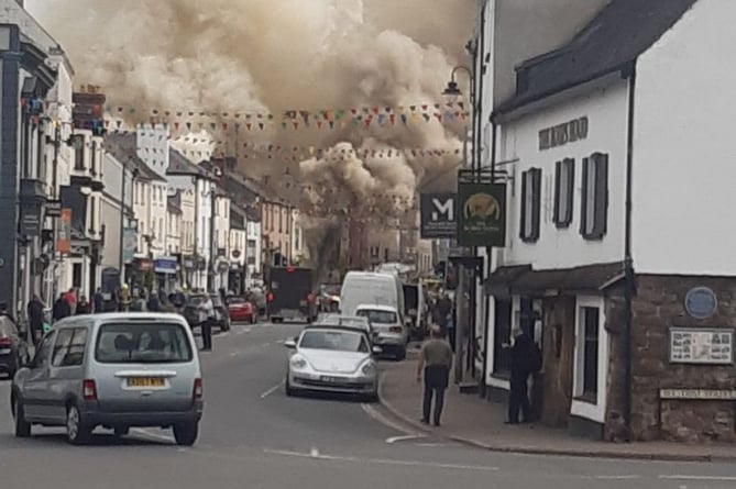 Smoke fills Monnow Street as the fire burns out of control