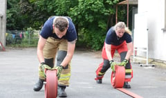 Rolling hoses for firefighters’ charity