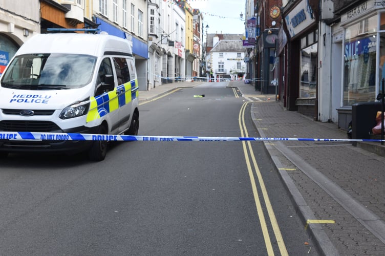The scene yesterday as police sealed off Monnow Street