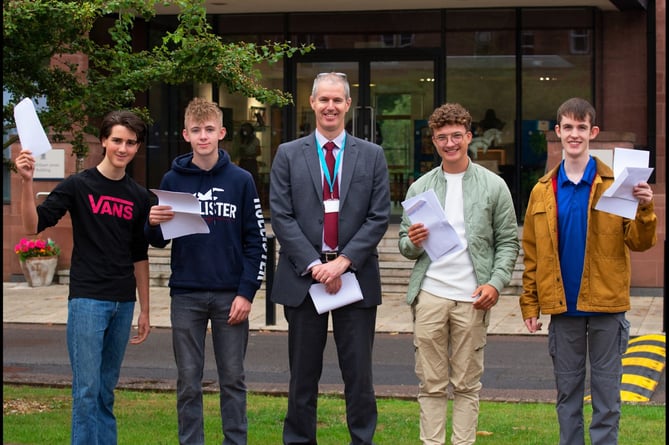 Headmaster at Monmouth School for Boys, Mr Simon Dorman, with GCSE students (from left): Lydney’s Sam Rolls, Monmouth’s Samuel Chamberlain, Thomas Hodgkinson, from Chepstow, and Miles Taylor, from Ross-on-Wye.