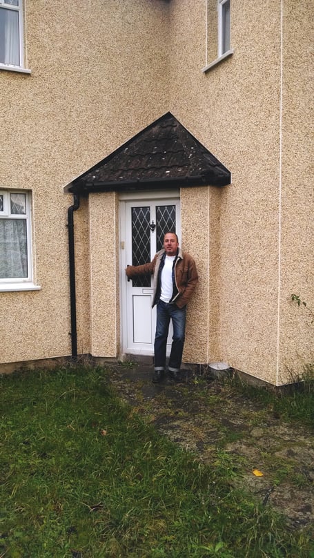 Adam Nicke outside his rental home in Chepstow