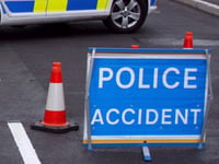 Woman hospitalised after car overturns in town street
