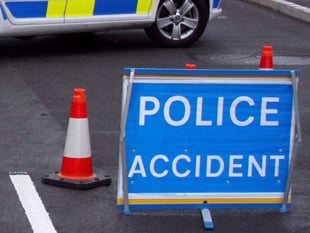 Woman hospitalised after car overturns in town street