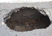 This is the hole that suddenly appeared in a busy town centre road