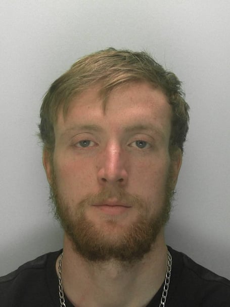 Police headshot of John Snee