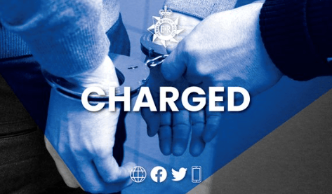 Officer charged with image and data offences