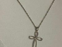 Necklace stolen in house raid 