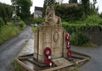 Forest of Dean road closed as four hurt in war memorial car crash