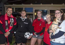 Walkers take on football-themed Moonlight Walk for Great Oaks Hospice