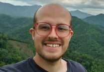 Student killed in bike crash after parents dropped him at university