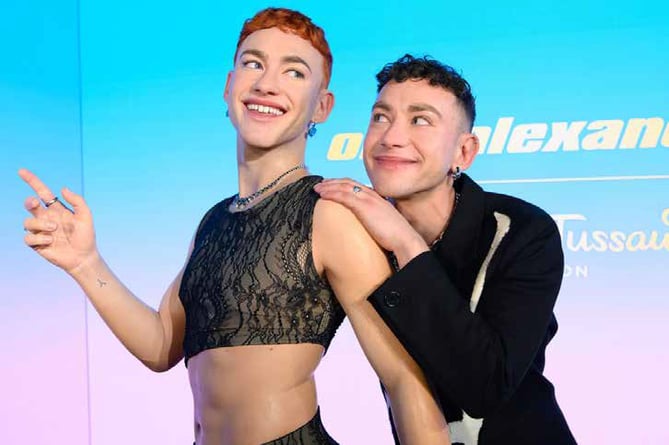 Which is which? It’s hard to tell Olly Alexander apart from his Madame Tussaud waxwork.