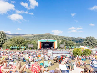 Terror charge sparks renewed calls to drop Kneecap from Green Man