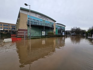 Flooding through drains closes road and Monmouth Leisure Centre