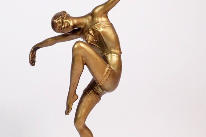 Art Deco bronze dancing figure.png