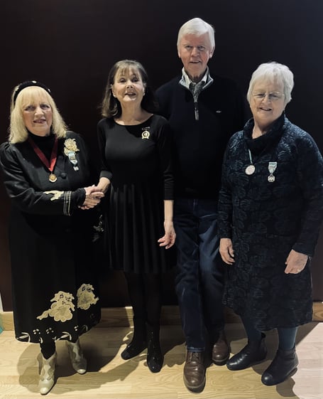 Helen Stidolph is presented with a Commendation Medal for dedicated service to musical theatre by Dee McIlroy, NODA Wales & Ireland Regional Representative, watched by president Diane Sillman and chairman Stephen Brettle
