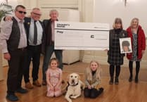 County's Elvis helps fund two Hound Dogs