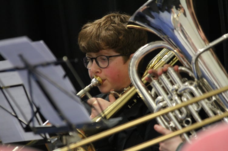 A musician gets set to blow the audience away