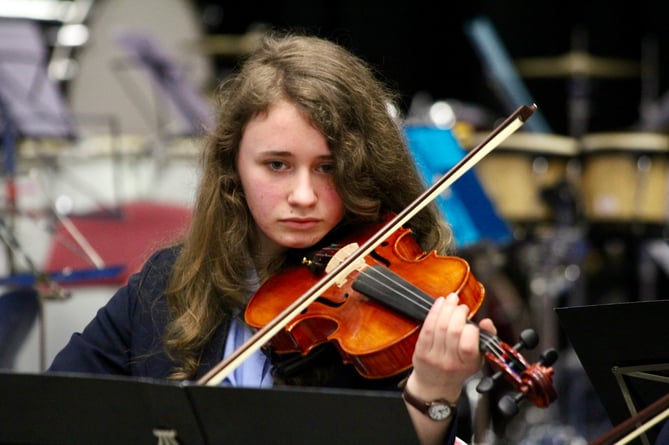 A violinist in the Monmouth Comprehensive String Ensemble