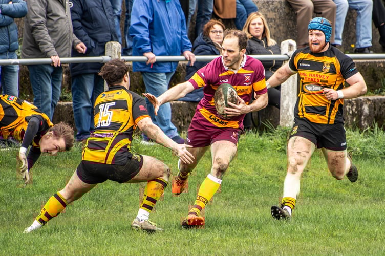Anthony Squire makes a try-scoring break for Abergavenny