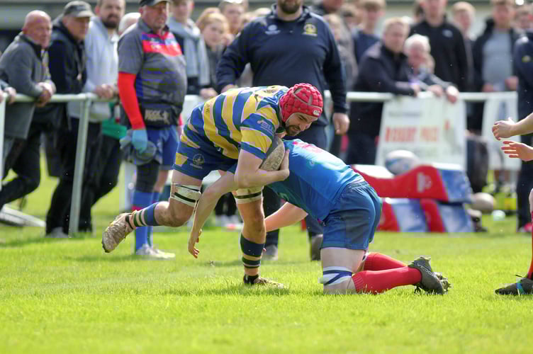 Kester Mobbs Morgan is tackled