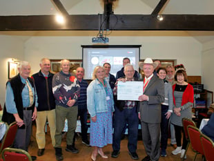 Gathering of the Green enthusiasts donate to Welsh charity