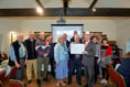 Gathering of the Green enthusiasts donate to Welsh charity