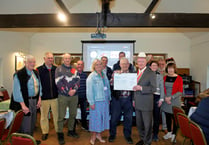 Gathering of the Green enthusiasts donate to Welsh charity