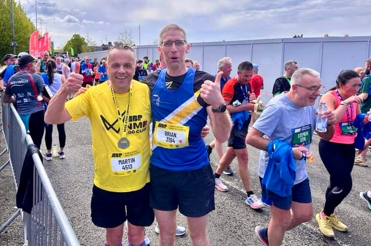 Martin Blakebrough and Brian Evans celebrate their half marathon effort. Photos: Spirit of Monmouth RC