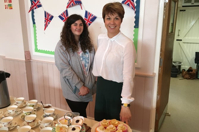 Alice Thompson and Claire Bodman with home-baked cakes on the NAAFI stall. 