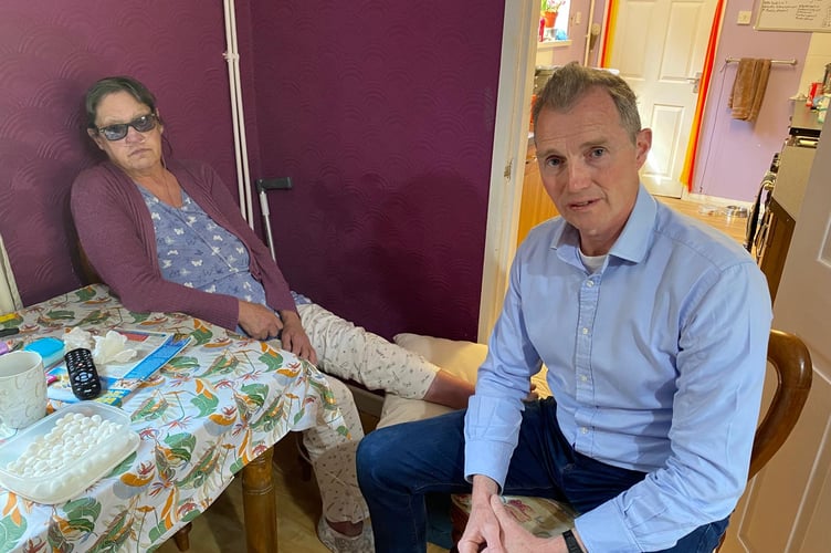 Victim of flood crash Deborah Wilson with MP David Davies