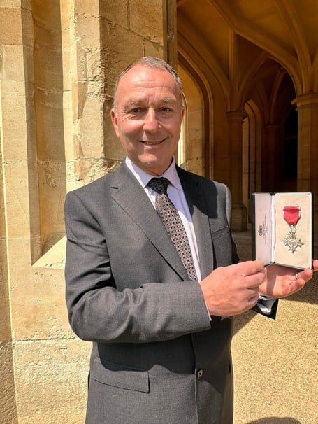 Former MP for Monmouth and member of Monmouth's Male Voice Choir receives an MBE at Buckingham Palace