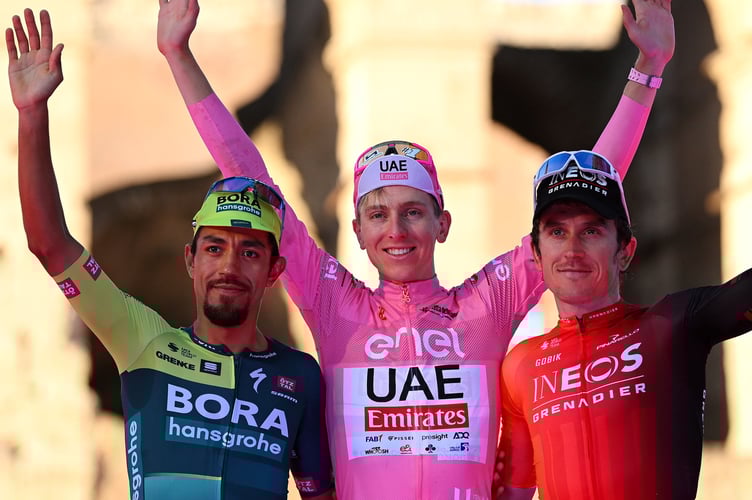Geraint Thomas, right, soaks up the applause on the podium.
