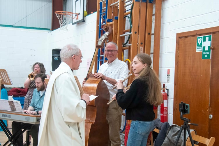 Archbishop Justin blesses the musicians.