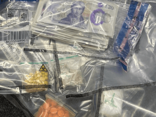Dealer caged after £3k drugs stash fell out in front of festival staff