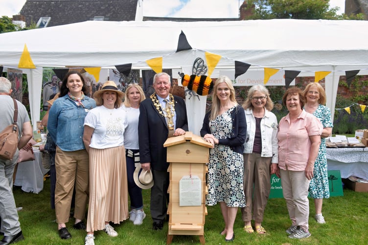 The Mayor of Monmouth, Cllr David Evans, with the new CEO Megan Denver, Founder Nicola Bradbear and volunteers