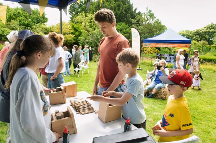 Isaac, Baxter, Hattie and Ramona making bee houses
