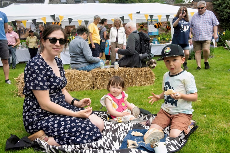 Sophie Richards with George, 5, and Ruby, 1, soak up the atmosphere